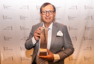 Jameel Ahmad Paul, 2023 Dhahan Prize Finalist with his hand-crafted trophy Jameel Ahmad Paul, 2023 Dhahan Prize Finalist with trophy