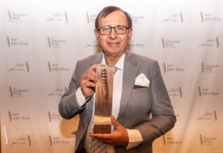 Jameel Ahmad Paul, 2023 Dhahan Prize Finalist with his hand-crafted trophy Jameel Ahmad Paul, 2023 Dhahan Prize Finalist with trophy