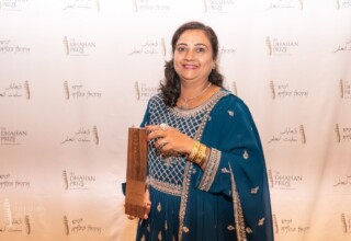 Deepti Babuta with a hand-crafted Dhahan Prize winner's trophy Deepti Babuta - 2023 Dhahan Prize winner with trophy
