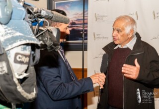 Dilbar Kang interviewing Sadhu Binning for Omni TV at the 2023 Dhahan Prize Ceremonies Dilbar Kang interviewing Sadhu Binning for Omni TV at the 2023 Dhahan Prize Ceremonies